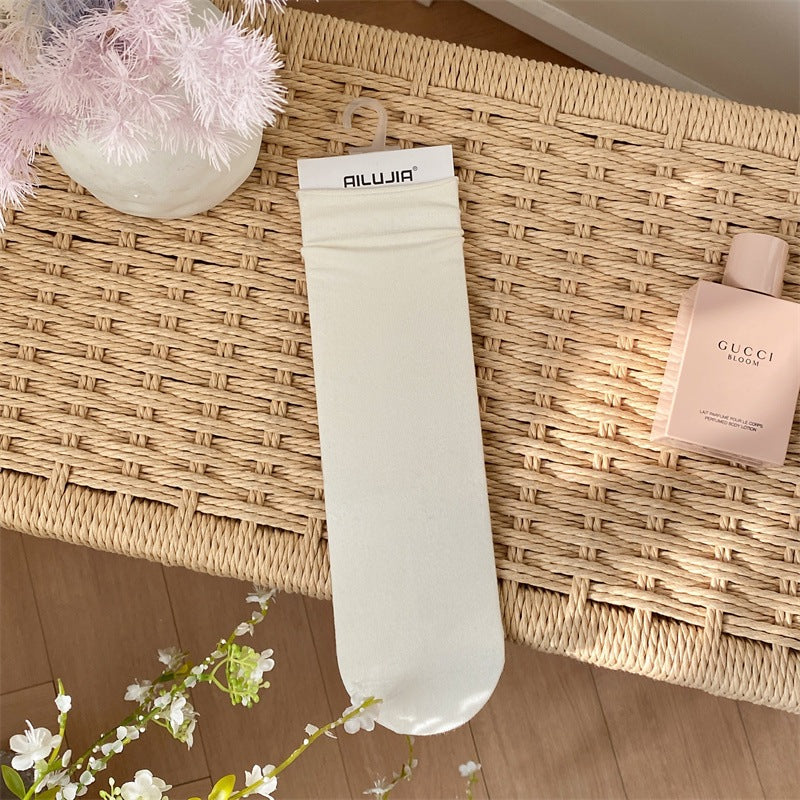 2025 spring and summer new college style classic solid color stacking socks breathable all-in-one machine boneless seam head medium tube women's socks